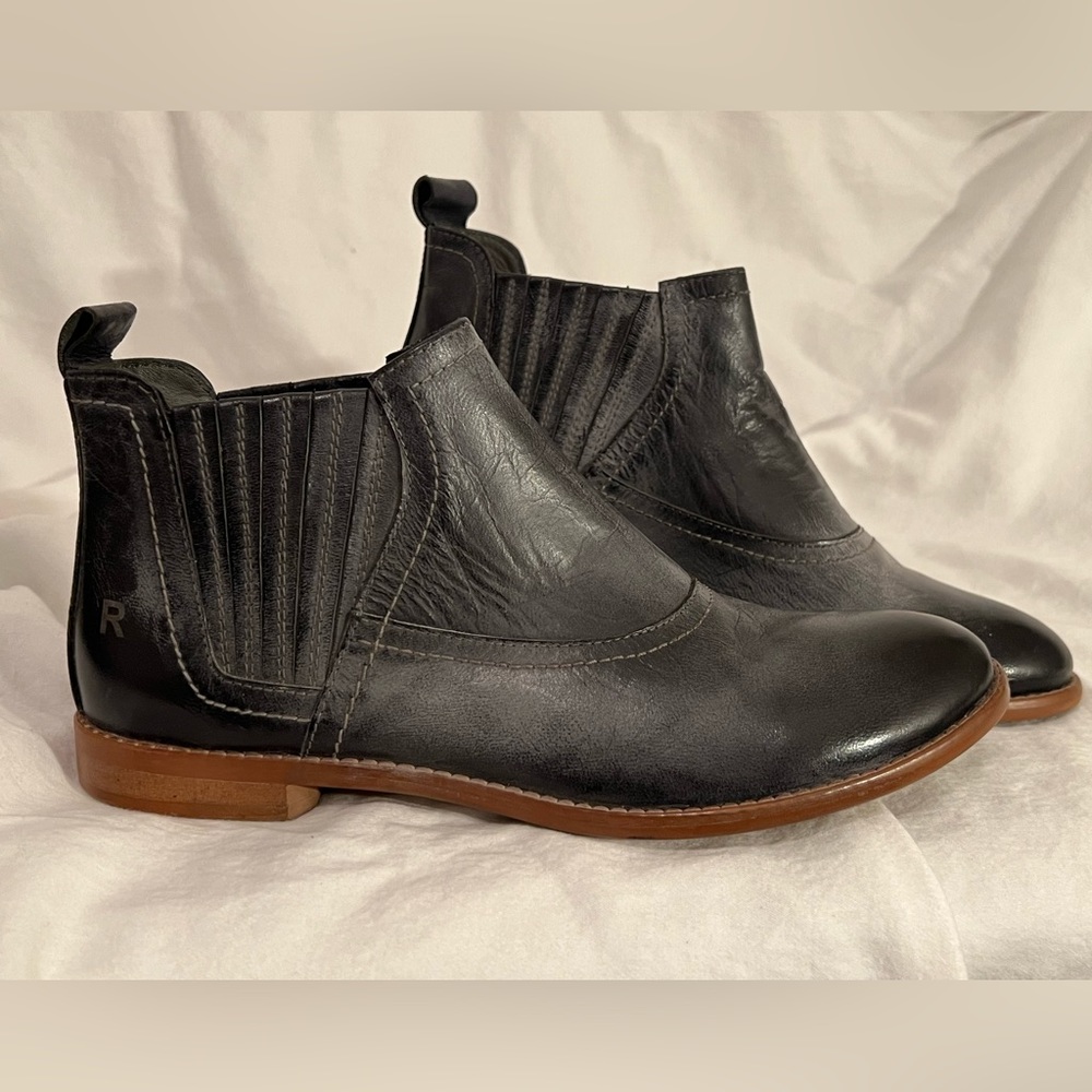 Gray leather ankle booties.